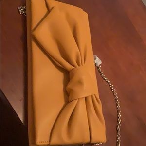 Orange bow crossbody bag